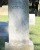 Shared grave marker for George, Elizabeth, and Roy Poole